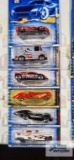 One 2000 CD Customs series Hot Wheels car, two 2000 series Tony Hawk Skate series Hot Wheels cars,