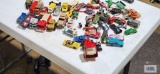 Variety of Matchbox, Hot Wheels, and other toy cars