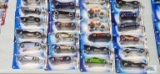 Thirty-two 2004 First Edition Hot Wheels cars, new in packages