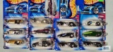 Thirteen 2004 First Editions Hard Zone Hot Wheels cars, new in packages