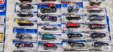 Twenty-four 1999 First Editions Hot Wheels cars, new in packages