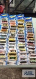 Fifty-nine 2001 Hot Wheels cars, new in packages