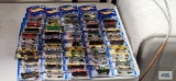 Forty-seven 2002 Hot Wheels cars new in packages
