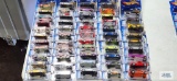 Fifty-one 2002 First Editions Hot Wheels cars, new in packages