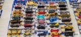 Forty-five 1999 and 2000 Hot Wheels cars, new in packages