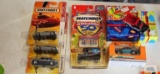Three 2009 Hot Wheels cars, Hot Wheels Across America 50th Birthday series truck, Volkswagen Beetle,