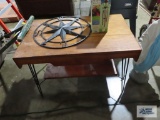 Wooden table with wrought iron legs