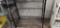 Black metal adjustable shelving unit