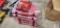 Milwaukee M12-M18 charger and five Milwaukee cases