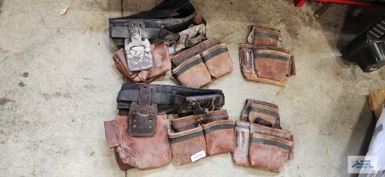 Two leather tool belts with two extra pouches