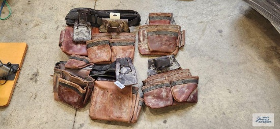 Two leather tool belts with extra pouches