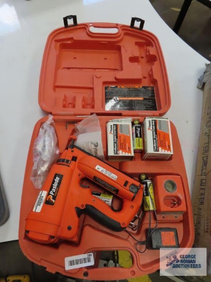 Paslode impulse framing nailer with extra fuel cells, one battery, one charger, and nails. Can be