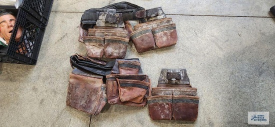 Two leather tool belts with extra pouches