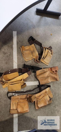 Four leather tool belts