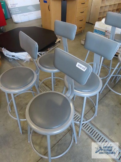 Four industrial style stools