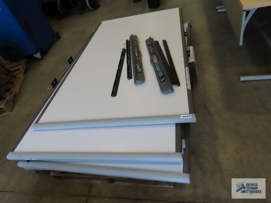 Six 7' by 4' Smart boards with two marker holders