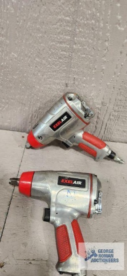 Two Exelair 1/2" impact wrenches