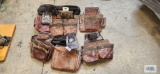 Two leather tool belts with extra pouches