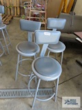 Three industrial style stools