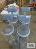 Four industrial style stools