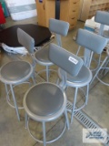 Four industrial style stools