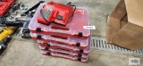 Milwaukee M12-M18 charger and five Milwaukee cases