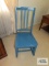 Antique blue painted rocker. On first floor.