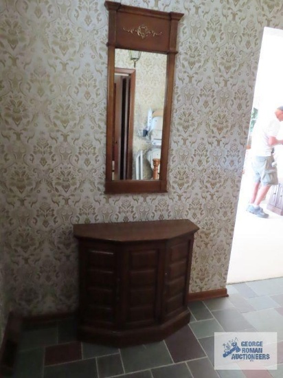 Fruitwood hall commode with matching mirror. On first floor.