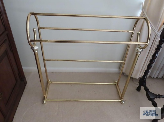 Brass finish quilt rack.