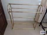 Brass finish quilt rack.