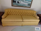 Yellow 7' sofa. On first floor.