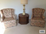 Pair of decorative wingback armchairs. On first floor.