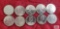 (7) 1969, 1972, 1975, and 1980 Canadian $1 coins