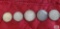 1874, 1896, and 1950 German one mark coins and 1913 and 1916 German half mark coins.