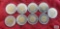 Nine Canadian two dollar loonie coins