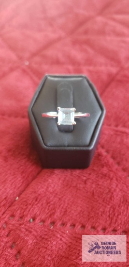 Silver colored ring with pale bluestone, marked 925.