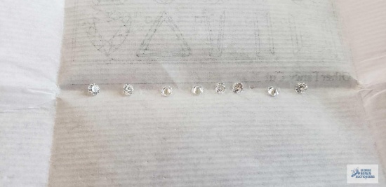 Variety of gemstones, tag marked cubic zirconia.