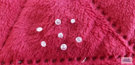 Seven loose clear gemstones, bags marked genuine diamond
