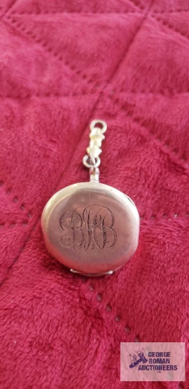 Gold colored pocket watch cover, marked Wadsworth warranty 20 years 1880630.