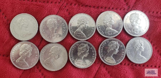 (7) 1969, 1972, 1975, and 1980 Canadian $1 coins