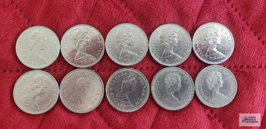 (10) Canadian $1 coins