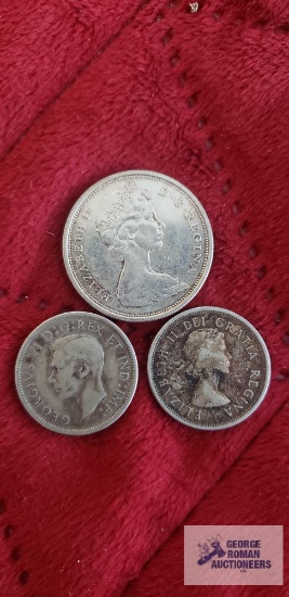 1965 Canadian 50 Cent coin. 1938 and 1961 quarters.