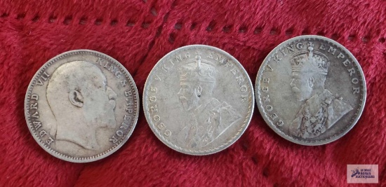 1907, 1917, and 1919 1 Rupee India coins.