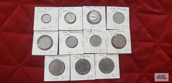 Italian coins in coin holders