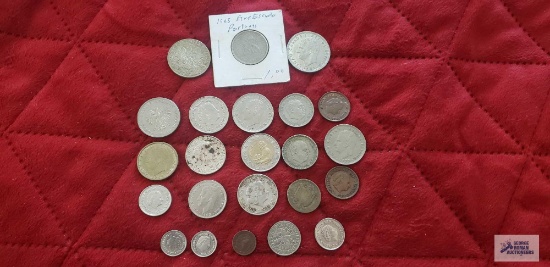 Coins from Spain, Portugal, Netherlands, and Poland.