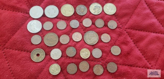 Variety of foreign coins.