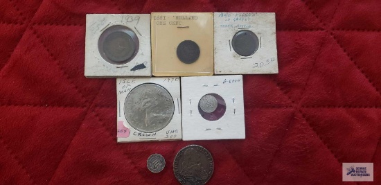 Foreign coins in coin holders
