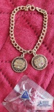 Two TRW Old Guard pendants (no markings found) on bracelet, clasp marked 1/20 12K GF. TRW 10 year