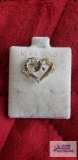 Two tone heart shape pendant, marked 10K