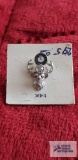 Silver colored deer head tie tack with clear gemstone, screw on back marked 14K.